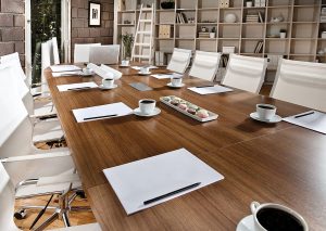 Meeting room with coffee,macaroon,pen and paper