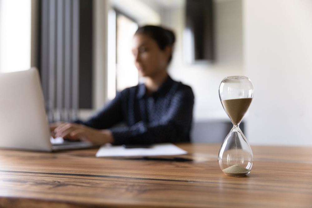 sand glass posed on desk